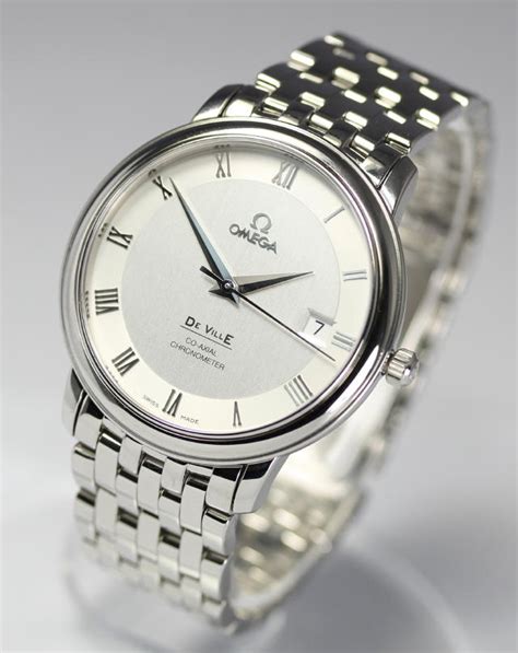 phân biệt đồng hồ omega thật